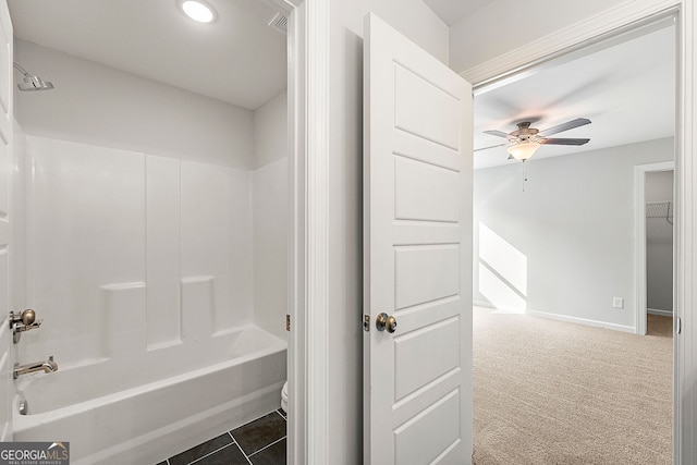 full bathroom with baseboards, shower / tub combination, and ceiling fan