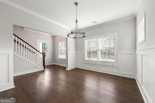 unfurnished dining area featuring a notable chandelier, a decorative wall, visible vents, and stairway