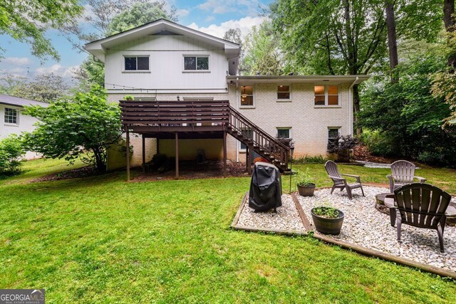2804 Dunnington Cir, Chamblee, GA 30341 - rear view of house featuring brick siding, stairs, a deck, a lawn, and a patio