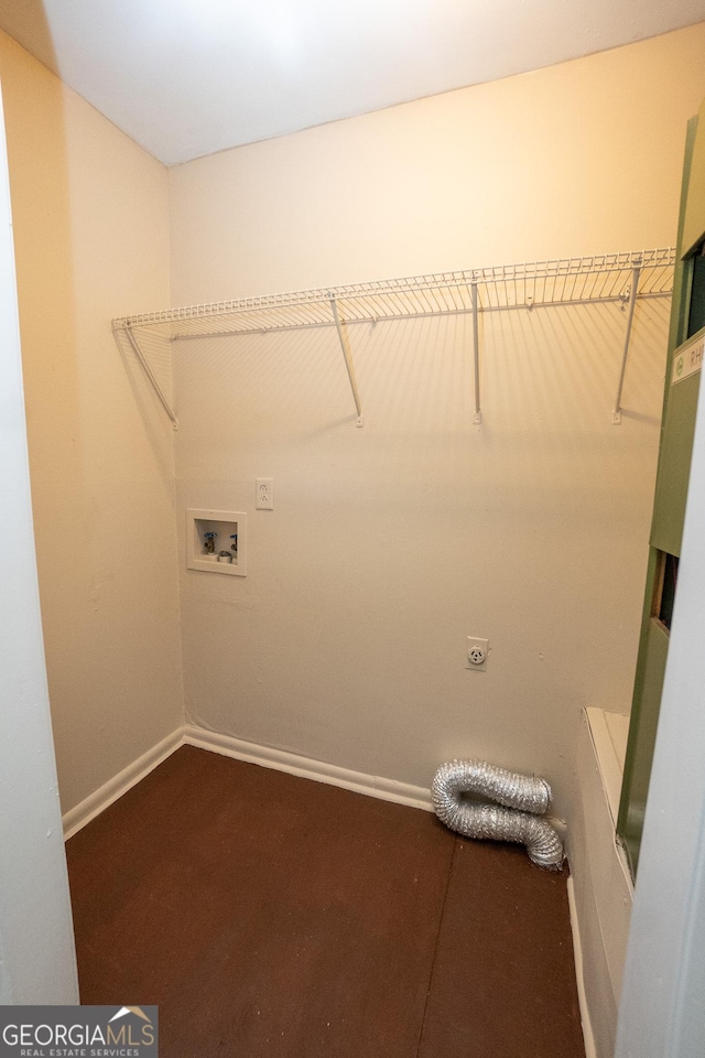 205 Butler St, Waycross, GA 31501 - clothes washing area featuring laundry area, hookup for a washing machine, baseboards, and electric dryer hookup