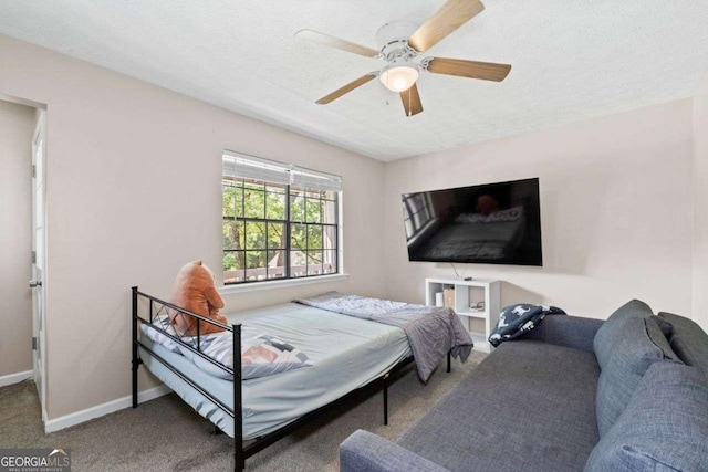 4971 Sharp Way, Duluth, GA 30096 - bedroom with carpet floors, baseboards, a textured ceiling, and ceiling fan
