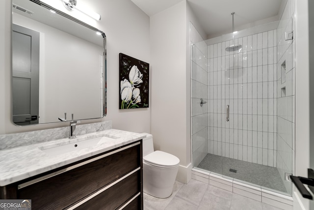 377 Charmont Dr, Tiger, GA 30576 - full bathroom with toilet, vanity, visible vents, a stall shower, and tile patterned flooring