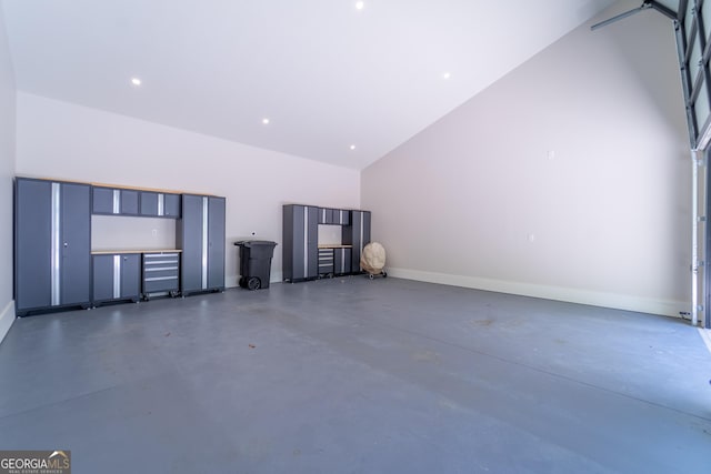 377 Charmont Dr, Tiger, GA 30576 - garage featuring baseboards and recessed lighting