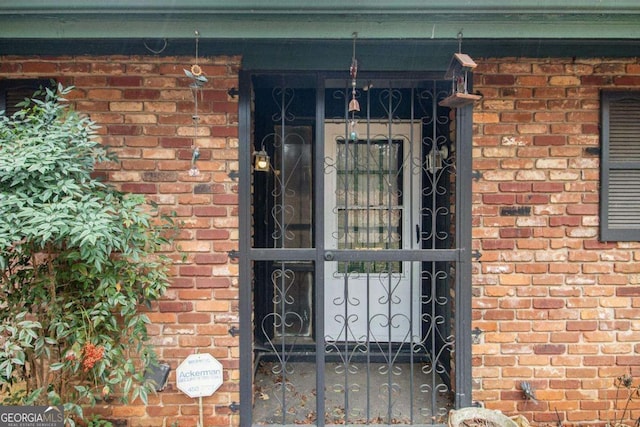 1491 Boulderwoods Dr, Atlanta, GA 30316 - doorway to property featuring brick siding
