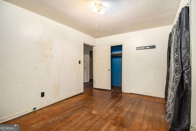 1491 Boulderwoods Dr, Atlanta, GA 30316 - unfurnished bedroom featuring baseboards and wood finished floors