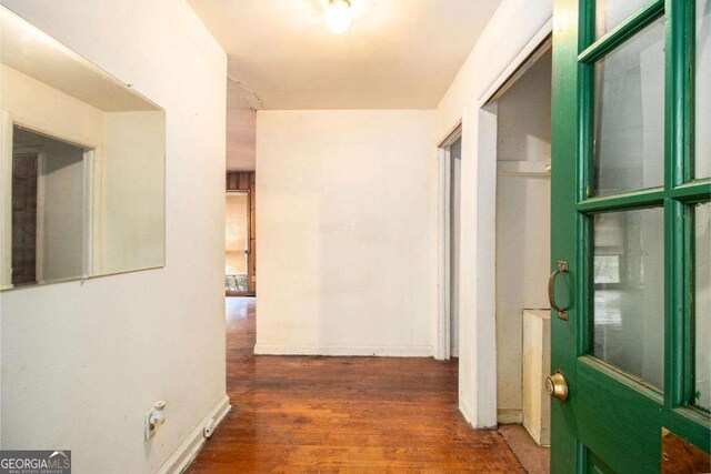 1491 Boulderwoods Dr, Atlanta, GA 30316 - hall featuring baseboards and wood finished floors