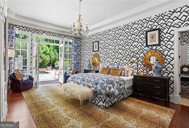 13922 Tree Loft Rd, Milton, GA 30004 - bedroom with wood finished floors, wallpapered walls, a notable chandelier, crown molding, and access to outside