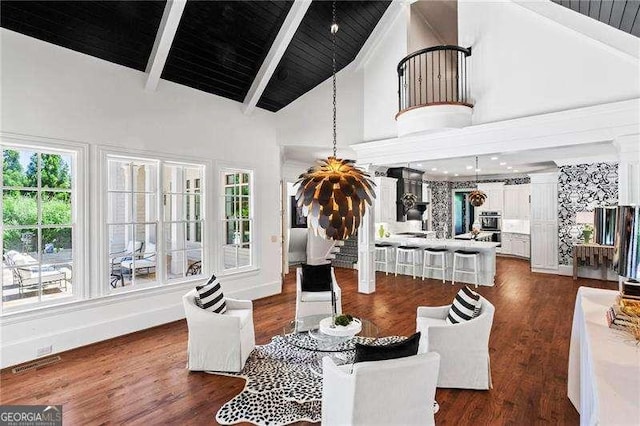 13922 Tree Loft Rd, Milton, GA 30004 - living room with high vaulted ceiling, beam ceiling, visible vents, dark wood-style flooring, and stairs