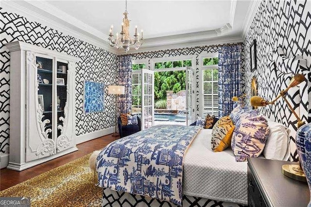 13922 Tree Loft Rd, Milton, GA 30004 - bedroom with ornamental molding, an inviting chandelier, and wallpapered walls
