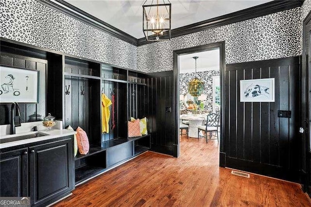 13922 Tree Loft Rd, Milton, GA 30004 - mudroom featuring a notable chandelier, wallpapered walls, visible vents, a sink, and crown molding