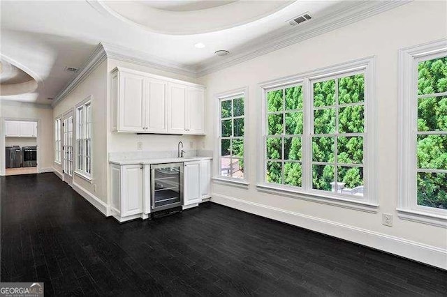 13922 Tree Loft Rd, Milton, GA 30004 - bar with crown molding, visible vents, dark wood-type flooring, wet bar, and wine cooler