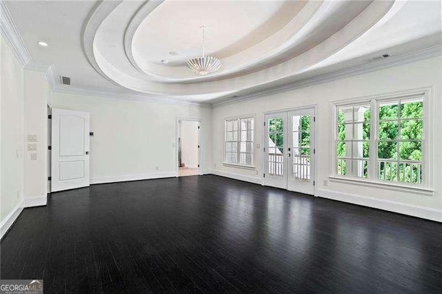 13922 Tree Loft Rd, Milton, GA 30004 - unfurnished living room with french doors, dark wood finished floors, visible vents, crown molding, and a raised ceiling