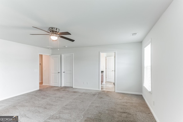 62 Blackberry Cir, Guyton, GA 31312 - unfurnished bedroom with multiple windows, visible vents, and carpet floors