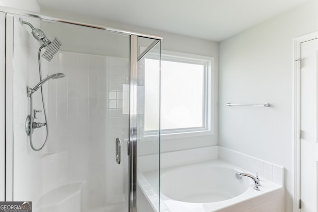 62 Blackberry Cir, Guyton, GA 31312 - bathroom featuring a bath and a stall shower