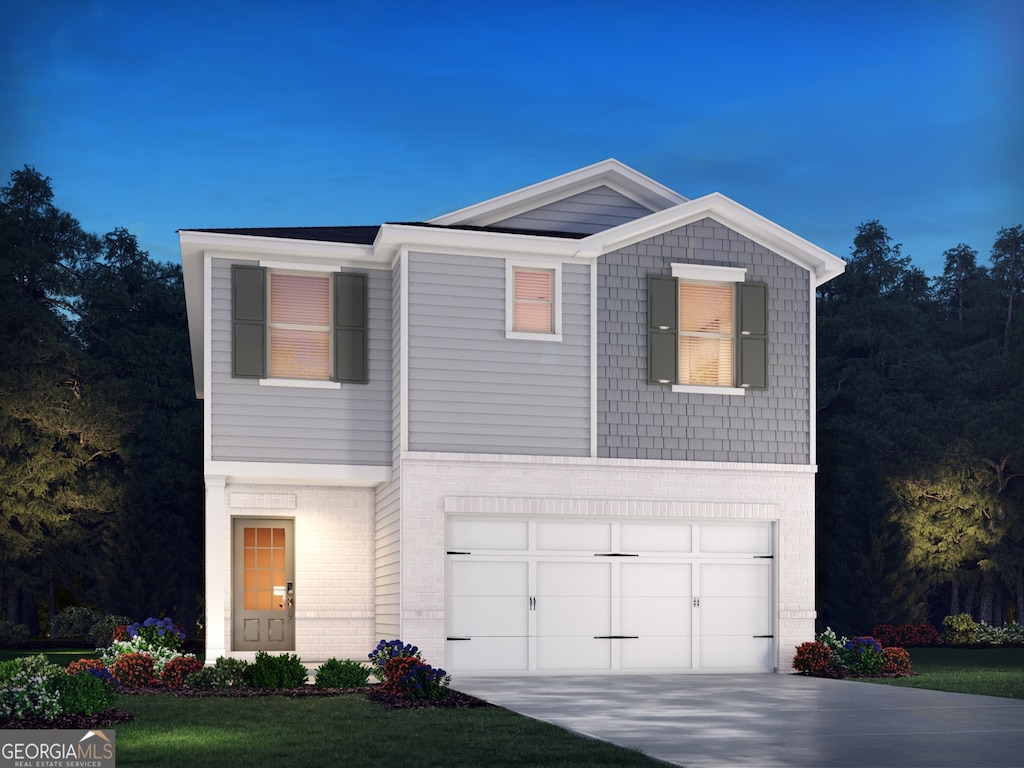 2760 Aralynn Way, College Park, GA 30337 - view of front of property featuring concrete driveway, brick siding, and a garage