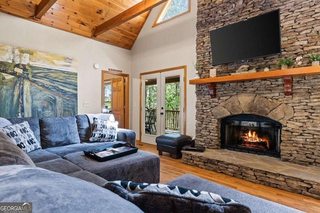 142 Amelia Ln, Blue Ridge, GA 30513 - living area featuring wood finished floors, high vaulted ceiling, beam ceiling, a fireplace, and wooden ceiling