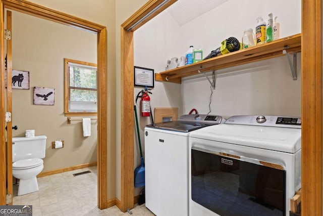 142 Amelia Ln, Blue Ridge, GA 30513 - washroom featuring light floors, baseboards, visible vents, and washer and dryer