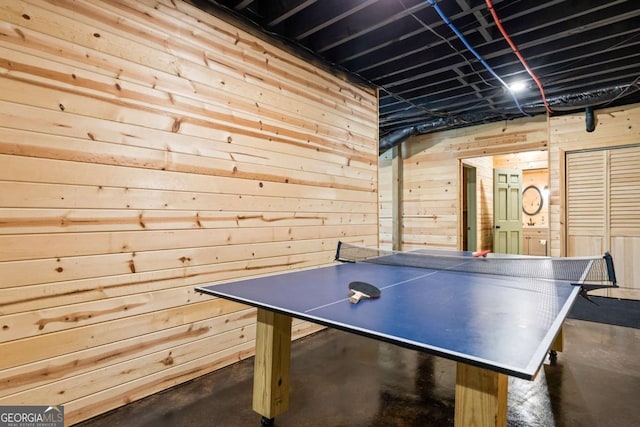 142 Amelia Ln, Blue Ridge, GA 30513 - rec room with wooden walls and concrete flooring