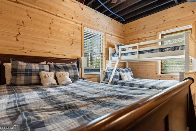 142 Amelia Ln, Blue Ridge, GA 30513 - bedroom featuring multiple windows and wooden walls