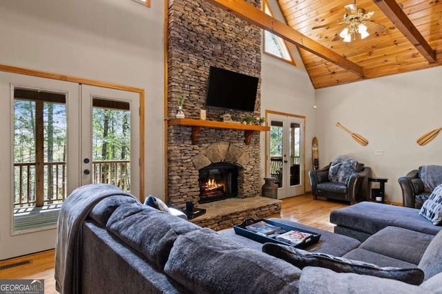 142 Amelia Ln, Blue Ridge, GA 30513 - living area with light wood-style floors, visible vents, french doors, and high vaulted ceiling
