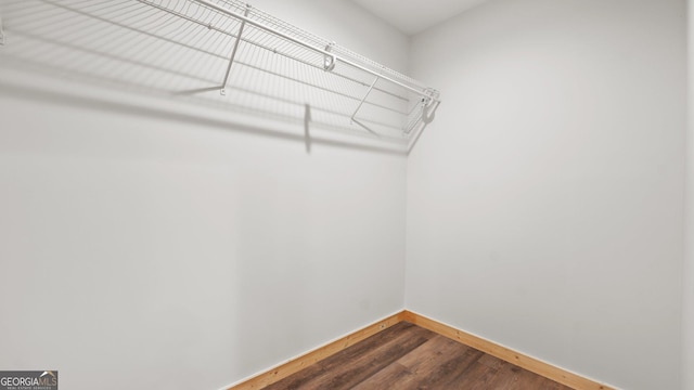 1297 Old Summerville Rd NW, Rome, GA 30165 - walk in closet with dark wood-style flooring