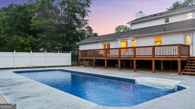 1297 Old Summerville Rd NW, Rome, GA 30165 - pool at dusk with a wooden deck and stairway