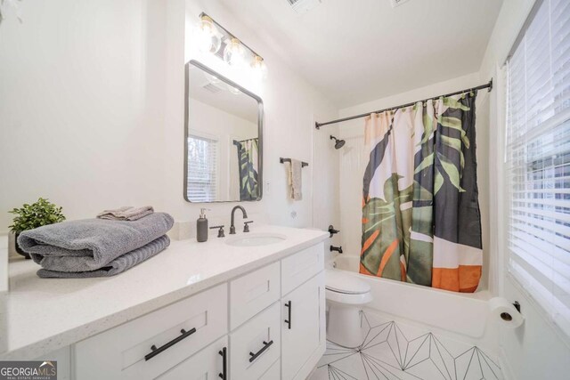 1893 Windsor Dr SW, Atlanta, GA 30311 - bedroom with baseboards, a ceiling fan, visible vents, and wood finished floors