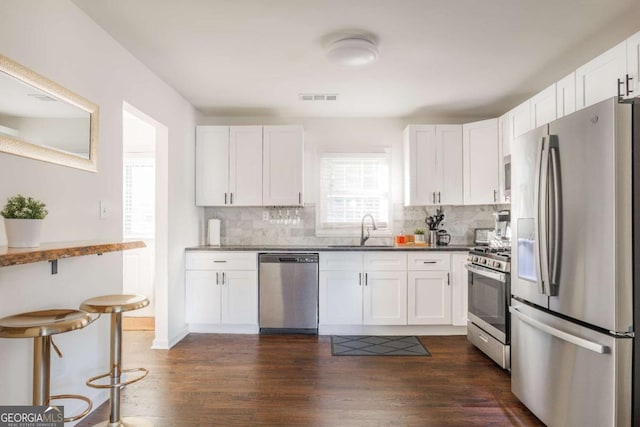 1893 Windsor Dr SW, Atlanta, GA 30311 - bedroom with a ceiling fan and wood finished floors