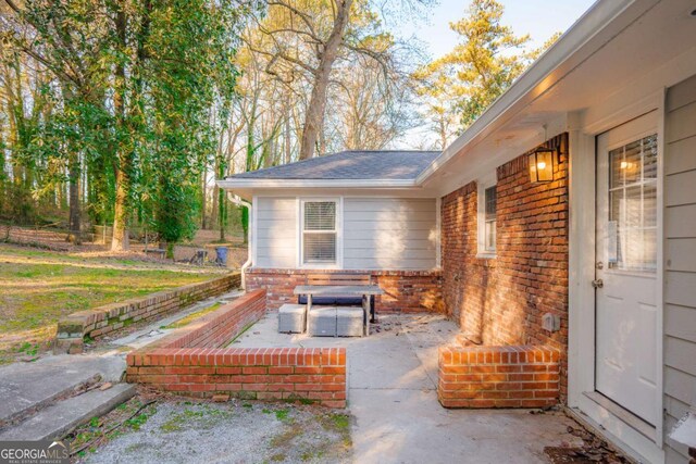 1893 Windsor Dr SW, Atlanta, GA 30311 - rear view of house with brick siding and fence