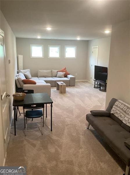 100 Ruby Ln, Mcdonough, GA 30252 - living area with light carpet, baseboards, and recessed lighting