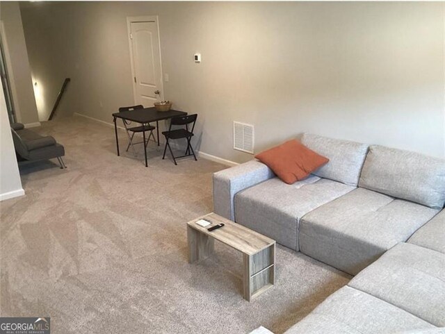 100 Ruby Ln, Mcdonough, GA 30252 - carpeted living area with baseboards