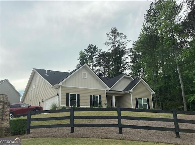 100 Ruby Ln, Mcdonough, GA 30252 - view of front of home featuring board and batten siding and an attached garage