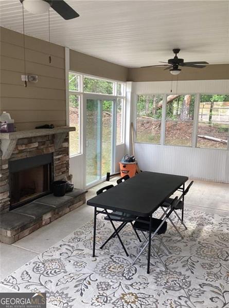 100 Ruby Ln, Mcdonough, GA 30252 - sunroom / solarium with ceiling fan and healthy amount of natural light