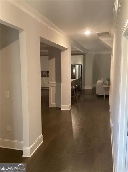 100 Ruby Ln, Mcdonough, GA 30252 - corridor featuring baseboards and dark wood finished floors