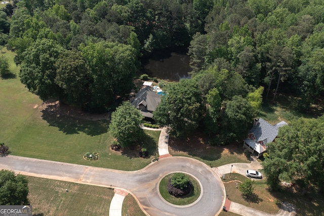 aerial view featuring a view of trees