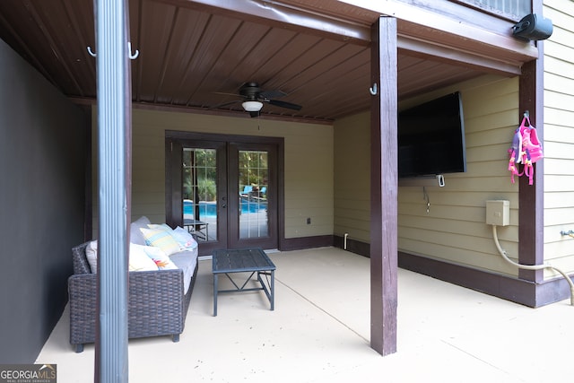 view of patio / terrace with a ceiling fan and french doors