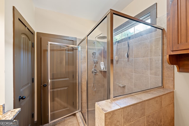bathroom with a stall shower