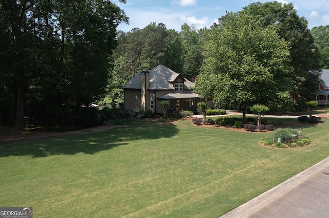 view of front of home with a front lawn