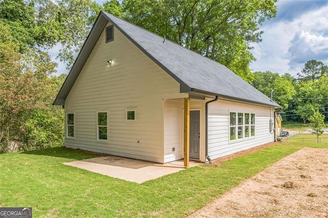 2621 Oldknow Dr NW, Atlanta, GA 30318 - rear view of property with a yard, a patio, and a shingled roof