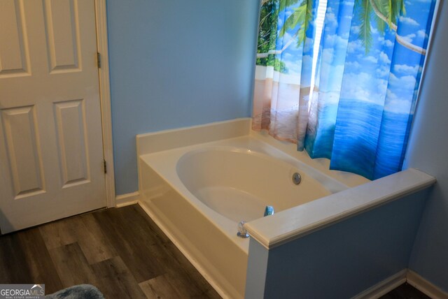 202 Willow Oak Way, Lizella, GA 31052 - full bathroom featuring a bath and wood finished floors