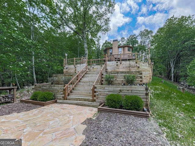 view of home's community with stairway