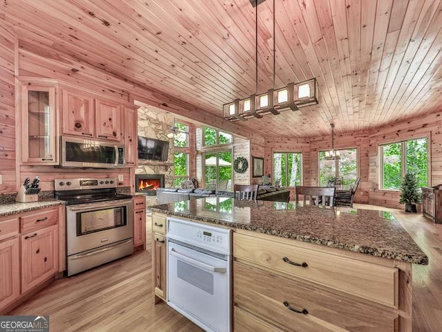 550 My Mountain Rd, Morganton, GA 30560 - kitchen featuring stainless steel appliances, wooden ceiling, open floor plan, light wood-type flooring, and dark stone countertops
