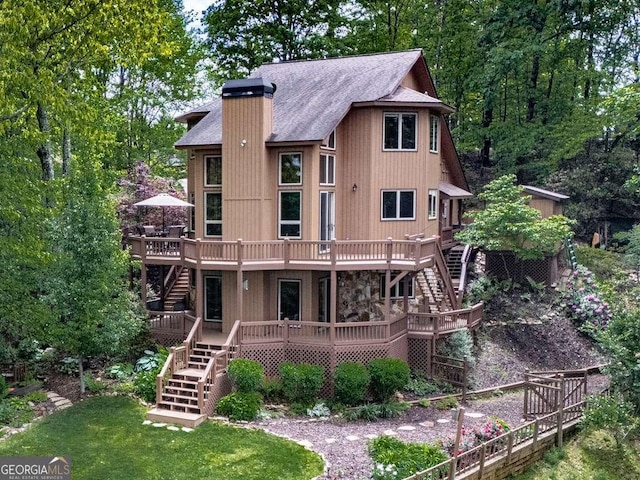 550 My Mountain Rd, Morganton, GA 30560 - back of house featuring stairway, a wooden deck, a chimney, and a shingled roof