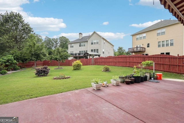 view of yard featuring an outdoor fire pit, a patio area, and a fenced backyard