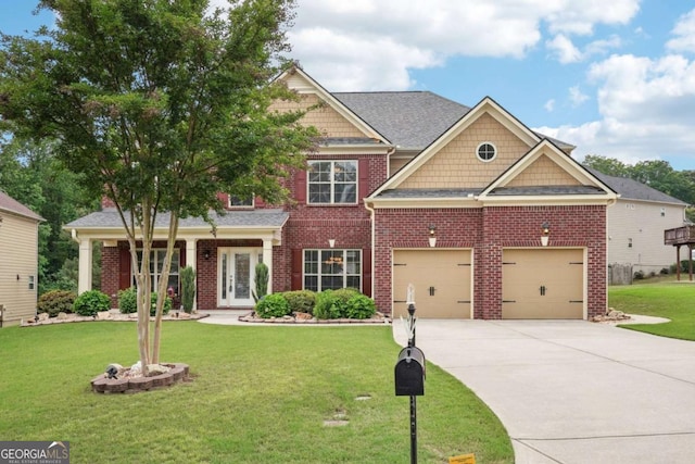 view of front of property with a garage, a front lawn, brick siding, and driveway