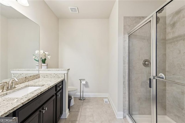 full bathroom with tile patterned floors, vanity, toilet, and a shower stall