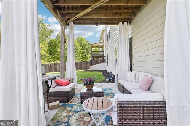view of patio with an outdoor hangout area and a fenced backyard