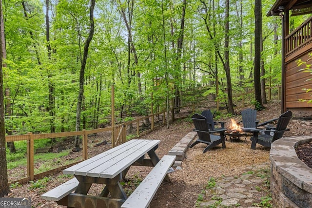 view of yard featuring a fire pit