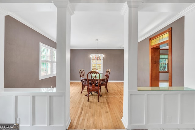 341 Fox Rd, Griffin, GA 30224 - dining room with crown molding, light wood-style floors, and a chandelier