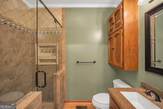 341 Fox Rd, Griffin, GA 30224 - full bath with toilet, a stall shower, crown molding, vanity, and baseboards